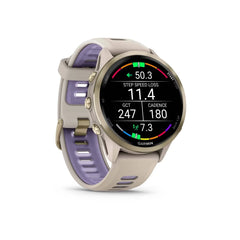 Garmin Forerunner 970 Smartwatch Soft Gold Titanium with French Gray Case and French Gray/Translucent Indigo Band